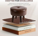 Small Foot Stool Ottoman, Round Pouf Foot Rest, Footstool Ottomans with Rubber Legs Under Desk, Faux Leather Footrest for Couch, Living Room, Bedroom, Office, 13''L x 13''W x 10.2''H, Coffee by CozyNest Decor