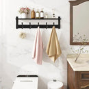Homode Coat Hanger Wall Mount with Shelf, 29 in Hanging Rack with Storage, Entryway Shelf with Pegs for Hanging Coats, Hats, Towels, Purse, Robes, Black by CozyNest Decor