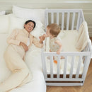 EvoNest Baby Crib, 6 in 1 Convertible Mini Crib with Wheels, 100% New Zealand Solid Wood Growing Bed, 4 Adjustable Mattress Height，White by TinyTreasures Baby Boutique