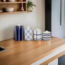 Young's Inc. 4 Pcs Set Cylindrical Ceramic Canisters- Storage Container for Kitchen and Bathroom - Beautiful Home Decor Accent to Store Food, Coffee, Tea, and More - White, Blue by CozyNest Decor