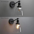 PERMO Industrial Vintage Sconces Slope Pole Single Sconce with 6.7" Oval Dome Clear Glass Shade Matte Black Wall Sconce Wall Mount Light Fixture for Bathroom Bedroom Entryway Home Office Kitchen by CozyNest Decor