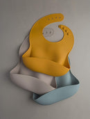 Loulou Lollipop Soft, Waterproof Silicone Feeding Bib by TinyTreasures Baby Boutique
