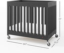 Foundations Boutique Folding Hotel Crib and Sheet Bundle - Includes Wooden Mini Crib with 3" Foam Mattress (Ebony) and 6-Pack White Fitted Compact Sheets by TinyTreasures Baby Boutique