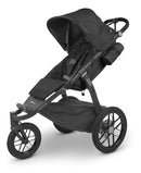 UPPAbaby Ridge Jogging Stroller/Durable Performance Jogger with Never-Flat Tires/Built for Walking, Running, Hiking/Water Bottle Holder and Basket Cover Included/Jake (Charcoal/Carbon Frame) by TinyTreasures Baby Boutique