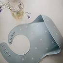 mushie Silicone Baby Bib | Adjustable Fit Waterproof Bibs (White Daisy) by TinyTreasures Baby Boutique