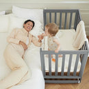 EvoNest Baby Crib, 11 in 1 Convertible Mini Crib with Wheels, 100% New Zealand Wood Growing Bed, 4 Adjustable Mattress Height,Grey by TinyTreasures Baby Boutique