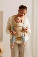BabyBjörn Baby Carrier Mini, Beige, Woven | Newborn Carrier (7-25 lbs), Ergonomic, Easy-to-Use by TinyTreasures Baby Boutique