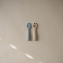 mushie Silicone First Feeding Baby Spoons | 2 Pack (Powder Blue/Shifting Sand) by TinyTreasures Baby Boutique