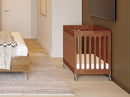 Foundations Boutique Folding Mini Baby Crib - Compact, Portable, Wooden Hotel Crib, Foldable Compact Cribs for Baby & Toddlers - Includes 3" Foam Mattress - Cherry by TinyTreasures Baby Boutique