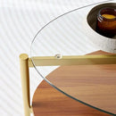 Oval Glass Coffee Table, Mid-Century Modern Design, L43 x W22 x H17 inch, 2-Tier Structure, Olive Shaped Clear Glass Top and Walnut Finish Wood Shelf, Tapered Legs with Gold Finish Frame by CozyNest Decor