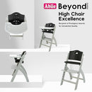 Abiie Beyond Junior Wooden High Chair with Tray - Adjustable and Convertible High Chair for Babies and Toddlers - 6 Months to 250 Lb - Water Resistant - Misty Grey Wood with Black Pearl Cushion by TinyTreasures Baby Boutique
