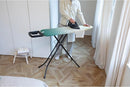 Brabantia - Ironing Board B – Solid Steam Iron Rest – Adjustable Height – Non-Slip Rubber Feet – 100% Fairtrade Cotton Cover with Foam Padding – Foldable – New Dawn – Size B (49 x 15 in) by CozyNest Decor