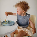 mushie Silicone Baby Bib | Adjustable Fit Waterproof Bibs (Boats) by TinyTreasures Baby Boutique