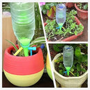 New Upgrade Plant Self Watering Spikes Devices, Plant Drip Irrigation System with Slow Release Control Valve Switch - Adjustable Watering Devices for Outdoor Indoor Garden Plants (16, Orange+Green) by GreenHaven Gardens