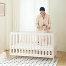 EvoNest Baby Crib, 11 in 1 Convertible Mini Crib with Wheels, 100% New Zealand Wood Growing Bed, 4 Adjustable Mattress Height,Washed Natural by TinyTreasures Baby Boutique