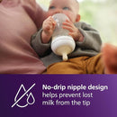Philips Avent Natural Baby Bottles with Natural Response Nipples (Fast Flow, Flow 4), 11oz, 4-Pack, SCY906/04 by TinyTreasures Baby Boutique