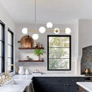 KCO Lighting Modern Globe Linear Chandelier 6 Light Milk Glass Chandeliers White and Gold Pendant Light Fixture Mid Century Rectangle Chandelier Brass Sputnik Island Lights for Kitchen by CozyNest Decor