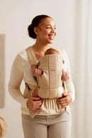 BabyBjörn Baby Carrier Mini, Beige, Woven | Newborn Carrier (7-25 lbs), Ergonomic, Easy-to-Use by TinyTreasures Baby Boutique