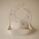 mushie x Bluey Silicone Baby Bib | Adjustable Fit Waterproof Bibs (Bluey Ivory) by TinyTreasures Baby Boutique