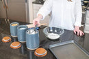 Nat & Jules Lidded Grey 6 inch Ceramic and Wood Kitchen Canisters Set of 3 by CozyNest Decor