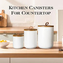 JOJUNO White Ceramic Canister Set with Wooden Lid, 3-Piece Airtight Food Storage Jars for Kitchen Counter - Flour, Sugar, Coffee, Tea, Spice - Small, Medium, Large Sizes by CozyNest Decor