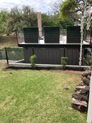 Artificial Boxwood Hedge Divider Wall with Black 201 Stainless Steel Planter Box (60" L X 48" H X 14" D) by GreenHaven Gardens