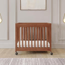 Foundations Boutique Folding Hotel Crib and Sheet Bundle - Includes Wooden Mini Crib with 3" Foam Mattress (Cherry) and 6-Pack White Fitted Compact Sheets by TinyTreasures Baby Boutique