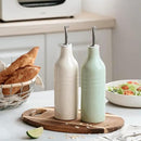 famiware Jupiter 16oz Ceramic Olive Oil Dispenser Bottle, Olive Oil and Vinegar Dispenser Bottle Set of 2 with Stainless Steel Pourers, Suitable for Storage Vinegar, Vanilla White & Light Green by CozyNest Decor