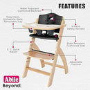 Abiie Beyond Junior Wooden High Chair with Tray - Adjustable and Convertible High Chair for Babies and Toddlers - 6 Months to 250 Lb - Water Resistant - Natural Wood/Black Pearl Cushion by TinyTreasures Baby Boutique