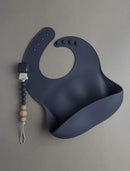 Loulou Lollipop Soft, Waterproof Silicone Feeding Bib by TinyTreasures Baby Boutique