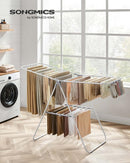 SONGMICS Clothes Drying Rack, with Sock Clips, Metal Laundry Rack, Foldable, Space-Saving, Free-Standing Airer, with 2 Height-Adjustable Gullwings, Indoor Outdoor Use, White and Gray ULLR052W02 by TinyTreasures Baby Boutique