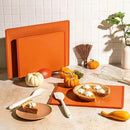 SMIRLY Plastic Cutting Board Set with Holder 3 Pieces, Non-Slip Dishwasher Safe Chopping Boards for Kitchen, Orange by CozyNest Decor