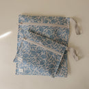 mushie Water Resistant Wet Bags | Large & Small Reusable Storage Bag for Baby Items and Travel | Zippered Pockets with Handle | Machine Washable, Set of 2 (Blue Flowers) by TinyTreasures Baby Boutique