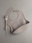 Loulou Lollipop Soft, Waterproof Silicone Feeding Bib by TinyTreasures Baby Boutique