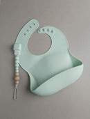 Loulou Lollipop Soft, Waterproof Silicone Feeding Bib by TinyTreasures Baby Boutique