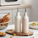 famiware Jupiter 16oz Ceramic Olive Oil Dispenser Bottle, Olive Oil and Vinegar Dispenser Bottle Set of 2 with Stainless Steel Pourers, Suitable for Storage Vinegar, Vanilla White & Light Pink by CozyNest Decor