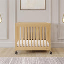 Foundations Boutique Folding Mini Baby Crib - Compact, Portable, Wooden Hotel Crib, Foldable Mini Cribs for Baby & Toddlers - Includes 3" Foam Mattress - Natural by TinyTreasures Baby Boutique