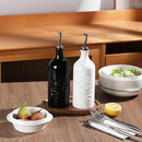 Sweejar Ceramic Olive Oil Dispenser Bottle, 20 Oz Relief Opaque Oil Cruet Protects To Reduce Oxidation, Suitable for Storage Vinegar, Soy Sauce,Liquids,Set of 2 (White Black) by CozyNest Decor