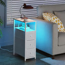 TUTOTAK Narrow LED Night Stand with Charging Station, Slim End Table with Plugins, Tall Side Table with 3 Fabric Drawer, Small Bedside Table with Storage, Set of 2, for Living Room, White TB01BW073L by CozyNest Decor