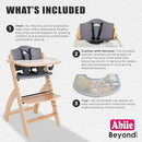 Abiie Beyond Junior Wooden High Chair with Tray - Adjustable and Convertible High Chair for Babies and Toddlers - 6 Months to 250 Lb - Water Resistant - Natural Wood with Dark Grey Cushion by TinyTreasures Baby Boutique