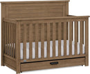 Delta Children Simmons Kids Caden 6-in-1 Convertible Crib with Trundle Drawer, Greenguard Gold Certified, Aged Oak by TinyTreasures Baby Boutique