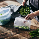 Stasher Premium Silicone Reusable Food Storage Snack Bag, Clear, Microwave, Sous Vide, Dishwasher, Oven and Freezer Safe, BPA Free, Leak-free, Eco-friendly, 12 Oz by TinyTreasures Baby Boutique