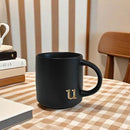 COLLECTIVE HOME - Black Monogram Ceramic Mugs, 15 oz Golden Initial Coffee Cups, Elegant Alphabet Tea Mugs, Personalized Halloween Mug with Gift Box, Perfect for Office and Home Décor (u) by CozyNest Decor