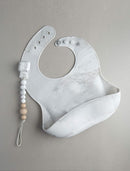 Loulou Lollipop Soft, Waterproof Silicone Feeding Bib by TinyTreasures Baby Boutique