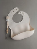 Loulou Lollipop Soft, Waterproof Silicone Feeding Bib by TinyTreasures Baby Boutique