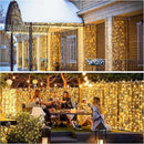 JMEXSUSS 900 LED Outdoor Christmas Curtain Lights, 9.5x29.5ft Christmas Lights Plug in with Remote, Twinkle Hanging String Light for Bedroom Wall Wedding Backdrop Window Gazebo Decor, Warm White by CozyNest Decor