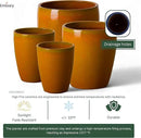 Emissary Bullet 9.5 in. Bright Orange Ceramic Round Planter (9.5 in. L x 9.5 in. W x 12 in. H) with Drainage Hole by CozyNest Decor