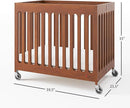 Foundations Boutique Folding Hotel Crib and Sheet Bundle - Includes Wooden Mini Crib with 3" Foam Mattress (Cherry) and 6-Pack White Fitted Compact Sheets by TinyTreasures Baby Boutique