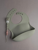 Loulou Lollipop Soft, Waterproof Silicone Feeding Bib by TinyTreasures Baby Boutique