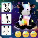 Cuteoy Light-up Singing Plush Cow LED Musical Stuffed Animal Adjustable Volume Lullaby Plushies Birthday Christmas Toy Gifts for Kids Toddler Girls, 13" by TinyTreasures Baby Boutique